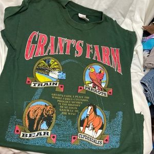 2 Men’s T-Shirts 1 Grants Farm w/animal pictures, 2nd T-Shirt Burnt Orange Med